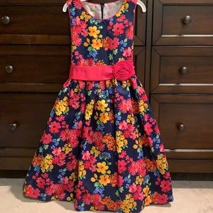 Girl’s sleeveless floral dress.  Size 8